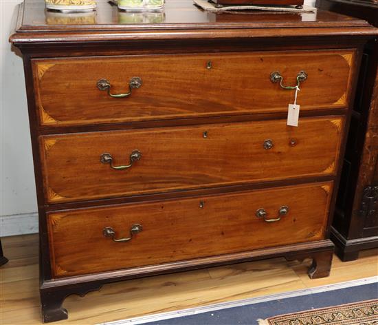 An Edwardian inlaid mahogany three drawer chest W.110cm